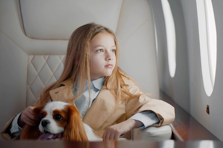 girl looking through the window